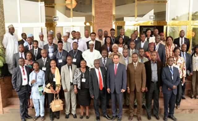 Representative of the Minister of Health (middle) in a group photograph during the stakeholders’ meeting on CCS - 30th January 2014