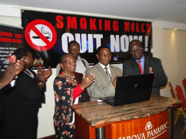 Dr Mandlhate WR Kenya accompanied by Dr Jackson Kioko, MOH, Dr Peter Peter Odhiambo (Tobacco Control Board and Mr Joel Gitali (behind them) , chairperson Kenya Tobacco Control Alliance as they launched the mass-media campaign in Nairobi.