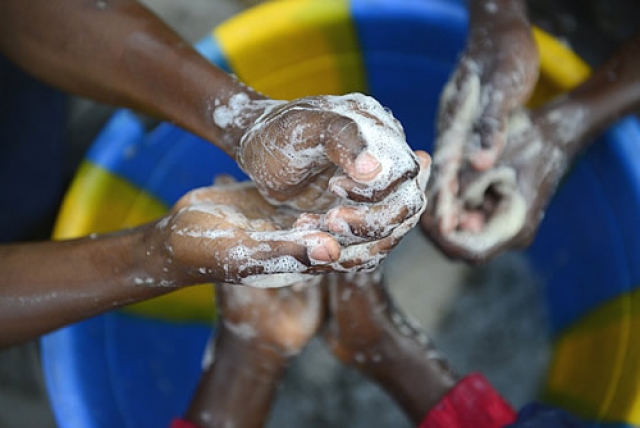 Washing hands with safe water and soap helps prevent cholera