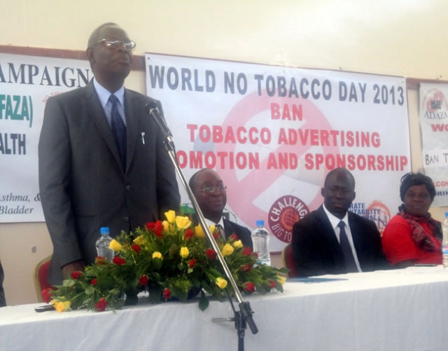 (L-R) The Hon. Minister of Health, Dr. Joseph Kasonde giving a statement to mark the WNTD at Nakatindi Hall in Lusaka, the WHO Representative, Dr. Olusegun Babaniyi , Dean, University of Zambia School of Medicine, Dr. Fastone Goma, and Mrs Brenda Chitindi, from the Tobacco Free Association of Zambia