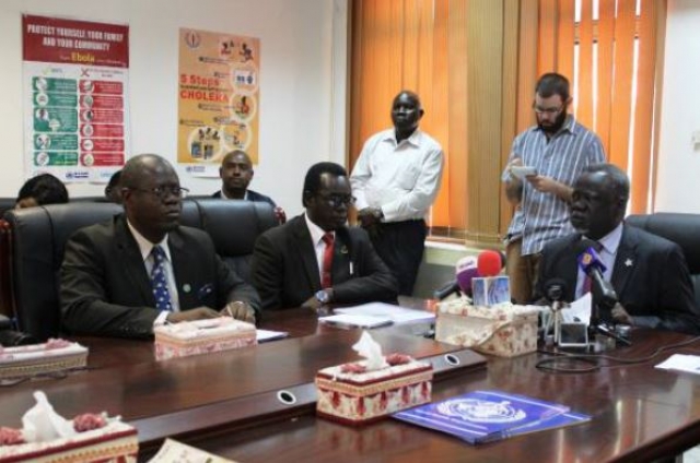 Minister of Health, Dr. Riek Gai Kok addressing the press conference on cholera in Juba, alongside tate Minister of Health for Central Equatoria State, Hon. Dr. Felix Ladu and WHO Country Representative Dr. Tarande Manzila.