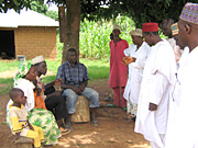 Gbata Village Health Committee members promoting immunization services