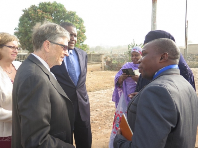 Dr Idowu (right) explaining the rationale for environmental surveillance to Mr Gates while Alhaji Dangote listened
