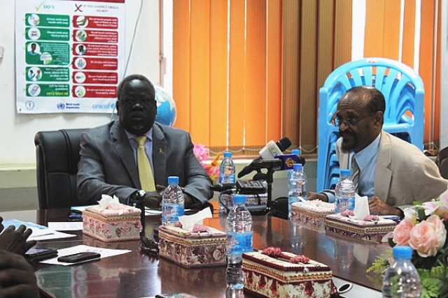 Minister of Health, Dr. Riek Gai Kok and WHO Representative for South Sudan, Dr Abdi Aden Mohamed addressing a joint press conference in Juba