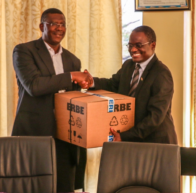 Standing left is WR Malawi Dr Eugene Nyarko handing over cervical cancer equipment and newborn and maternal health commodities at the MOH conference room and Dr Charles Mwansambo received the donation