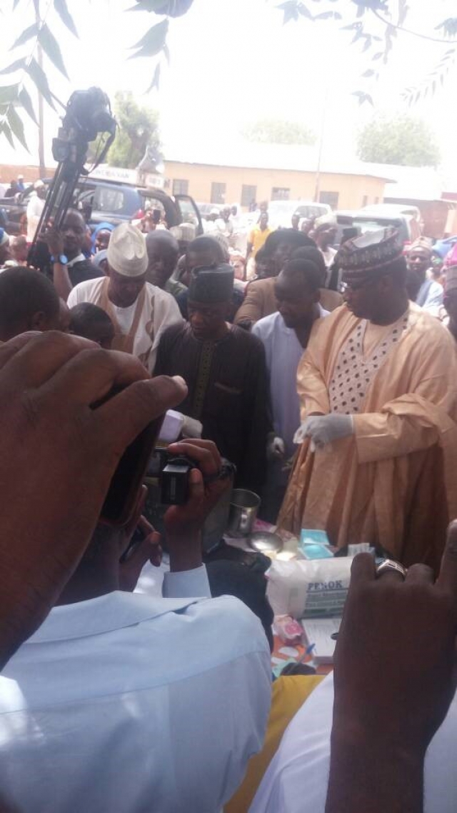 Sokoto Commissioner for Health (1st right) preparing to vaccinate a child at the flag-off