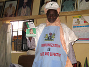 Kekun Nahuche displaying measles campaign materials
