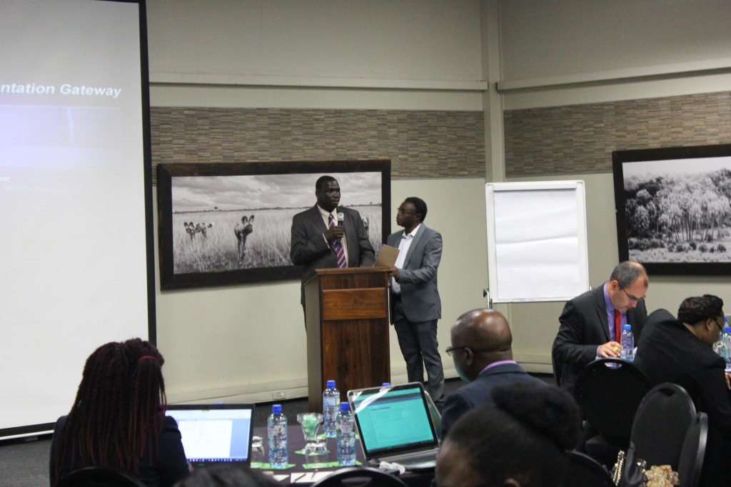 Assistant Director, environmental health at MOH, Mr. Mulonda Mate and Dr. Peter Songolo, Disease Prevention and Control Officer, WHO welcoming the participants.