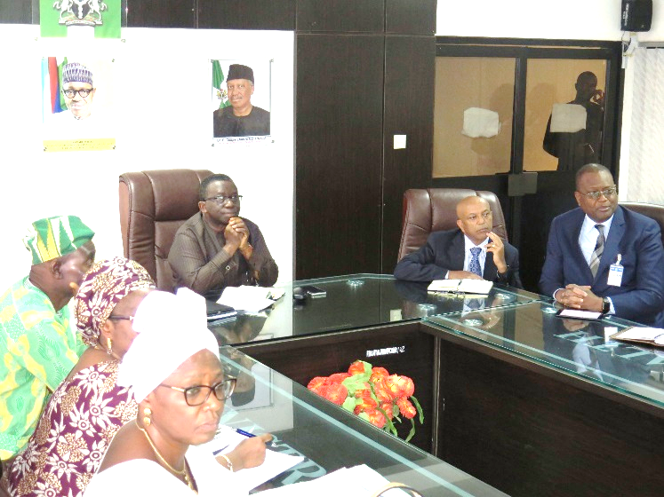 R-L Dr Dovlo, Dr Alemu, Professor Adewole and Directors of Federal Ministry of Health listeninf to presentation by 'Scoping Mission'.