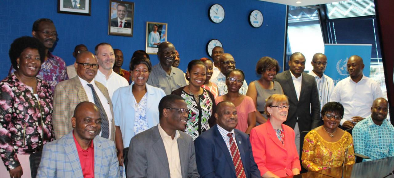 Participants at the FICSA training join the UN RC Ms J Barrins (seated in red jacket), WR Dr M Ovberedjo (seated to her right) and WHO ASA President Mrs B Fougue (on her left)