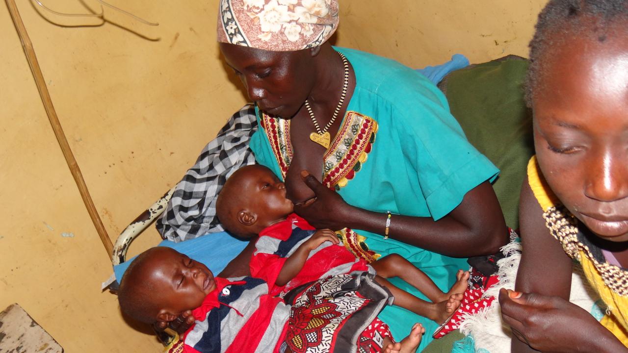 Ms Regina breastfeeding her twins