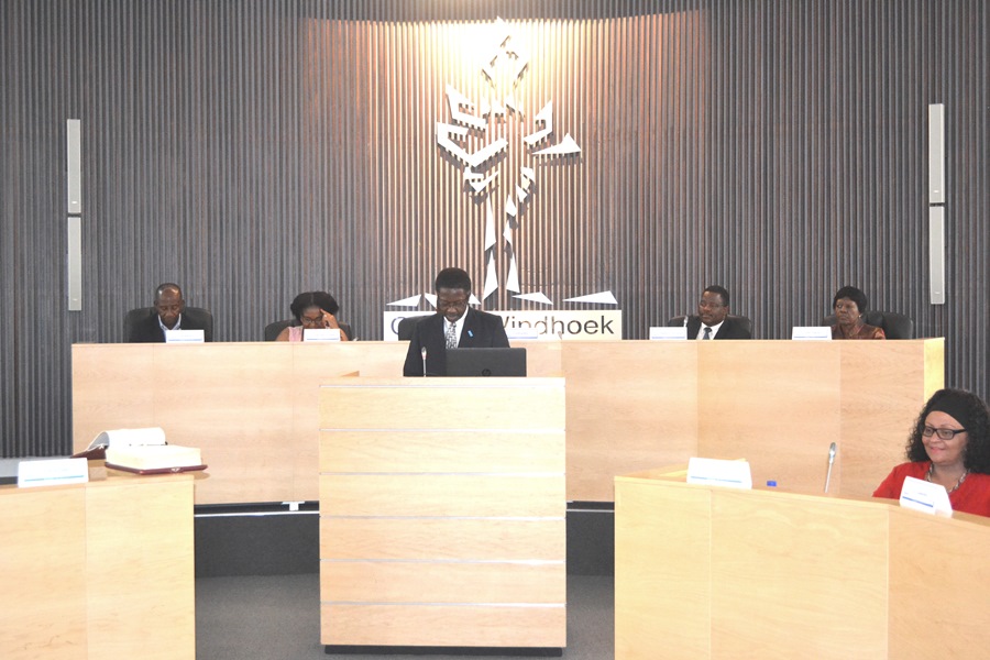 WHO Representative, Dr Charles Sagoe-Moses making his statement at the first City Council Meeting 