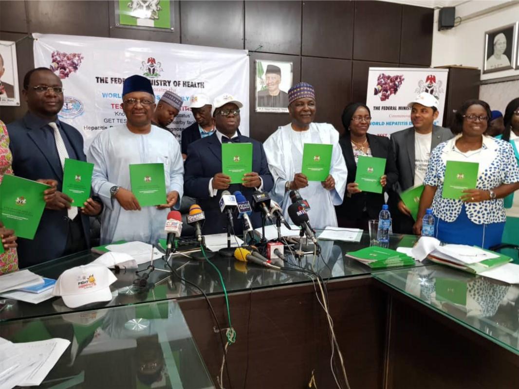 (L-R): WHO Nigeria acting Country representative WR a.i) Dr Rex Mpazanje; Minister of State, Ministry of Health, Dr Osagie Ehanire; Nigerian Minister of Health, Professor Isaac Adewole; Former Head of State, General Yakubu Gowon; Director of Public Health, Dr Evelyn Ngige and other partners pose for a group photograph.