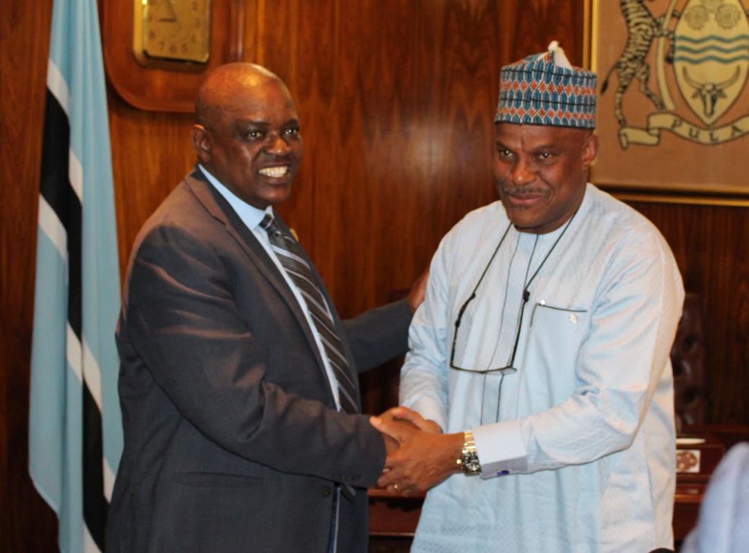 His Excellency Dr Mokgwetsi E.K. Masisi, President of the Republic of Botswana (left) meeting with Dr Martins Ovberedjo, the outgoing WHO Representative to Botswana (right)