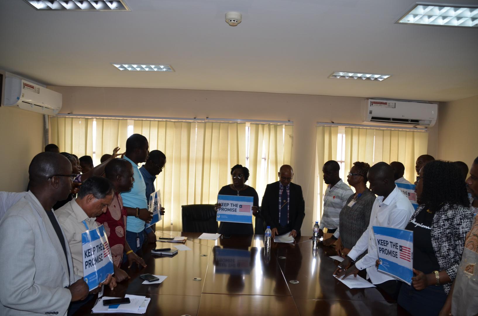 Stakeholders at the UHC Day program reaffirming their committment to Keep the Promise  