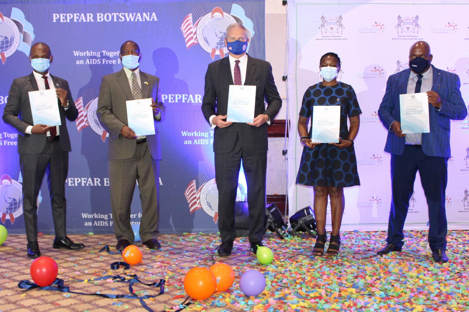 From left - Hon. Dikoloti (Min of MoHW), Mr Ebineng (Perm Sec of MoHW), Ambassador Cloud (USA), Dr Bataringaya (WHO HSS Advisor), Mr Morapedi (Dep. Perm Sec of Min of Local Gvt and Rural Dev) at launch of ICBHS guideline