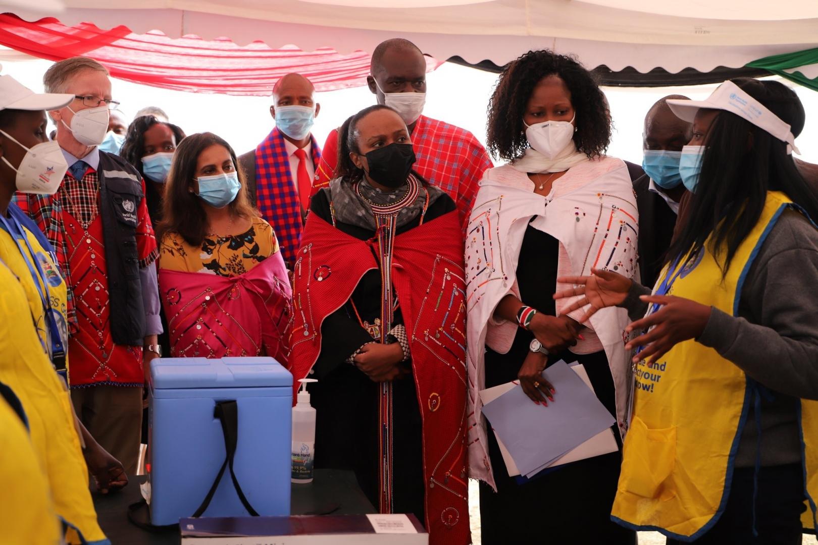 A health worker speaks to MOH and UN officials at the launch of measles rubella campaign in Kajiado county. Almost  4 million children are targeted