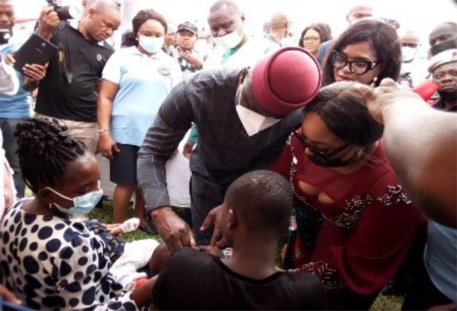 The Deputy Governor, Ude Oko Chukwu administering the vaccine to a child during the flag-off