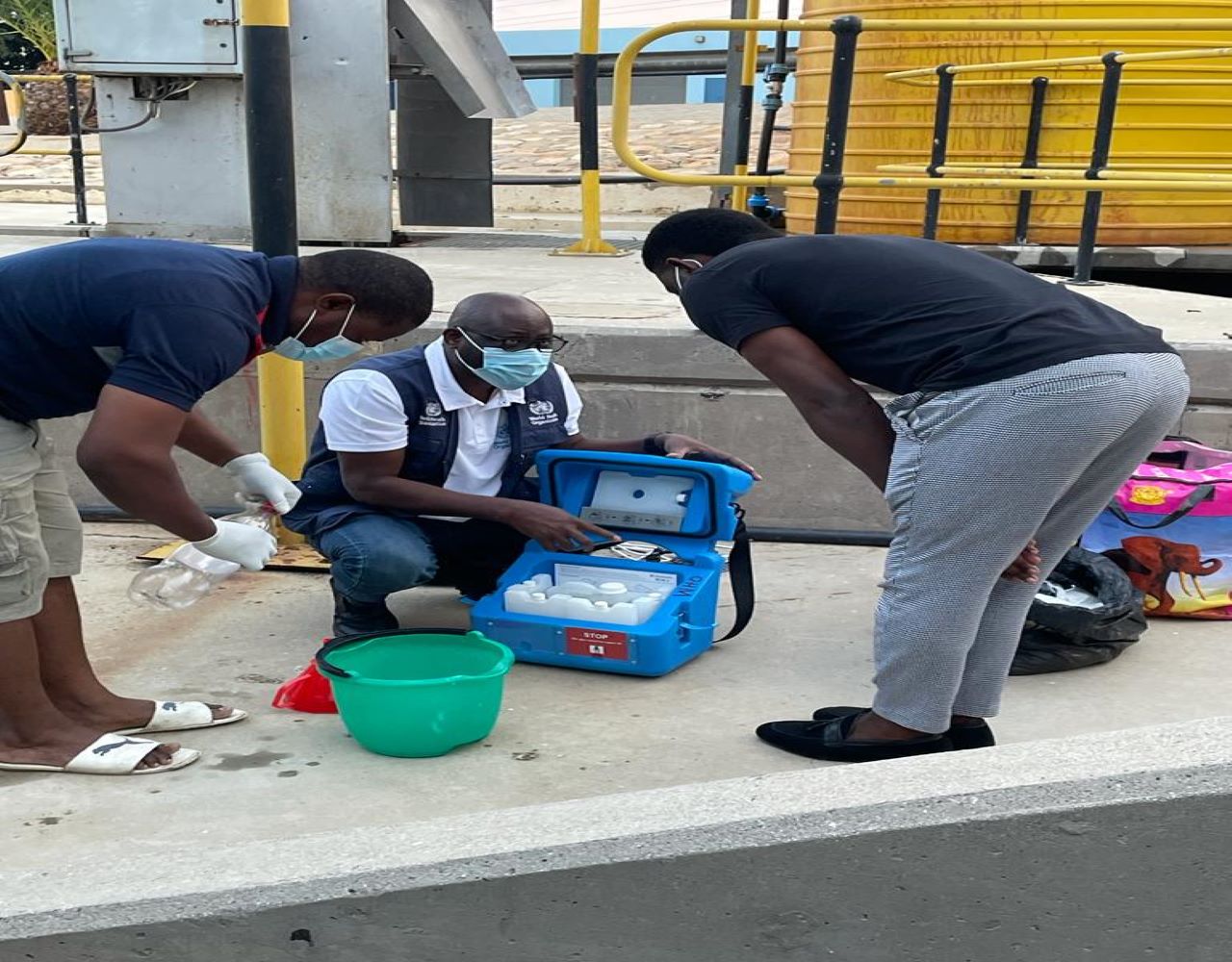 WHO Polio Consultant, Mr Constant Dedo training a newly recruited officer on environmental sample collection procedures at a sample collection site, Gammams Water Care, Windhoek