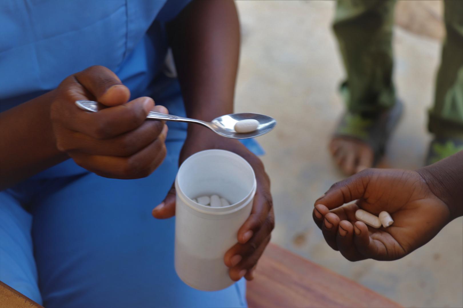 Child receiving her deworming medication during the campaign 