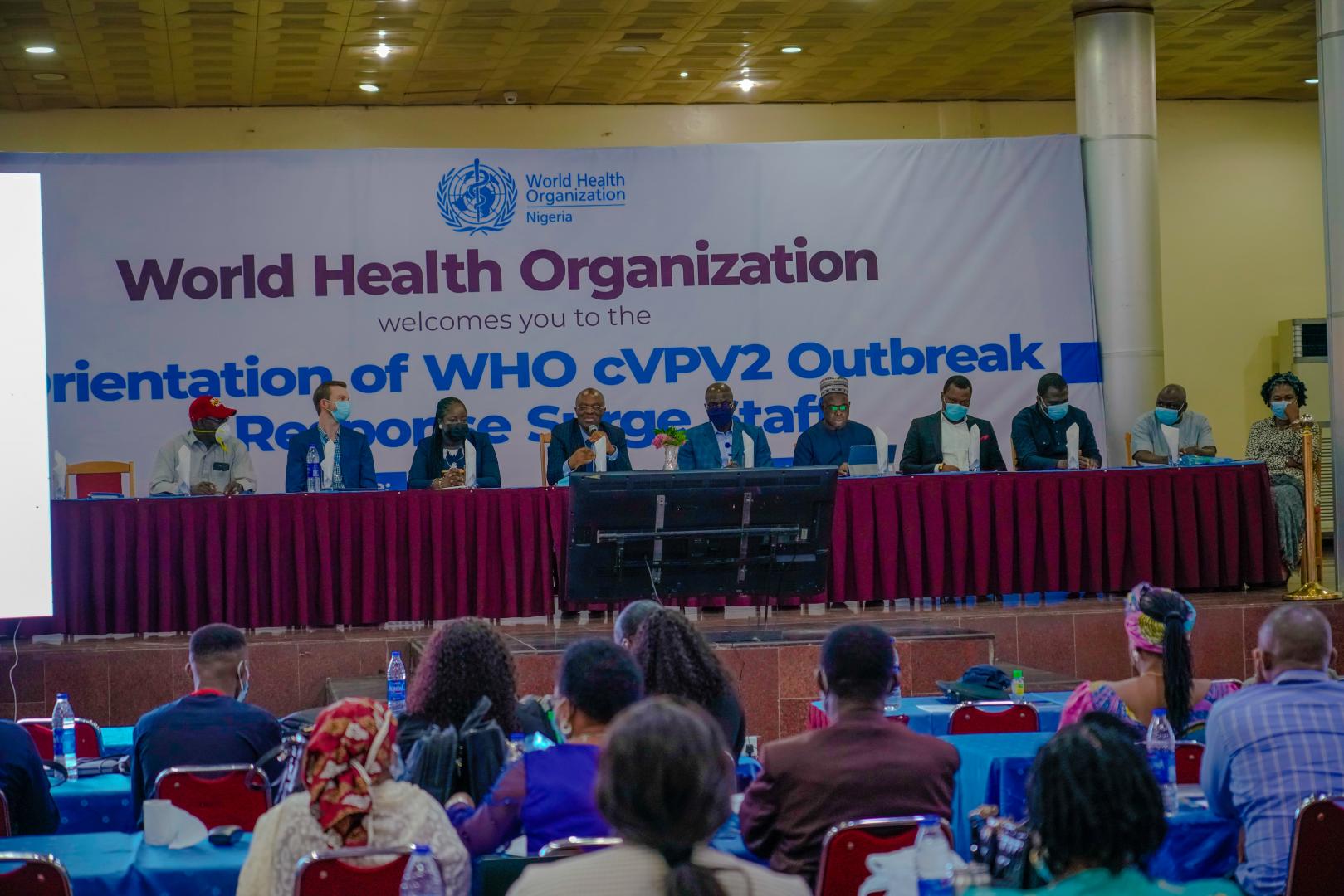 The WR (fourth from left) and representatives of partners at the high table 