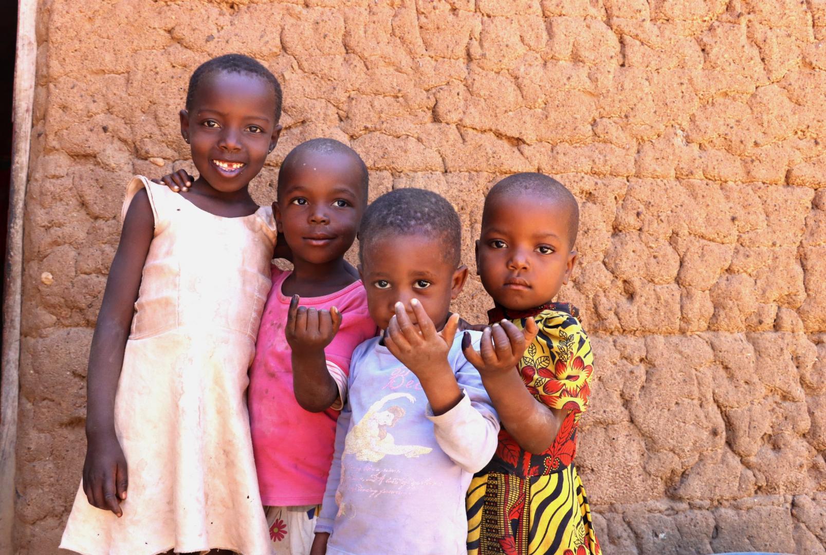 Children posing after receiving polio drops