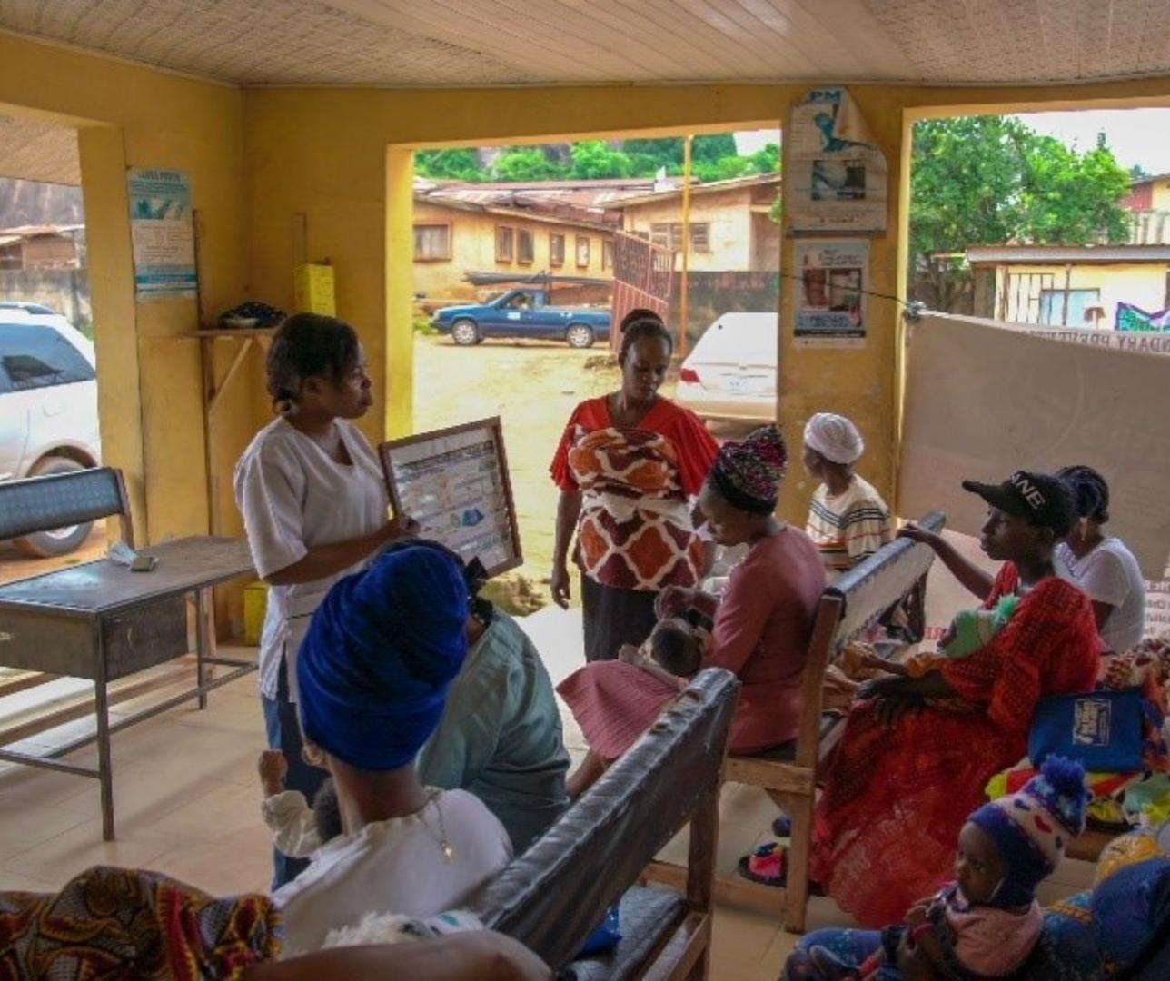 A health worker holding a FP/cervical cancer awareness talk in a clinic in Idanre , Ondo State 