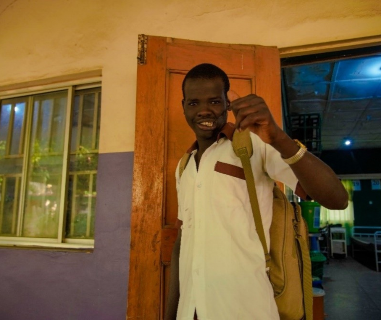 Mohammadu Usman at Noma Hospital leaving for school after his morning chores