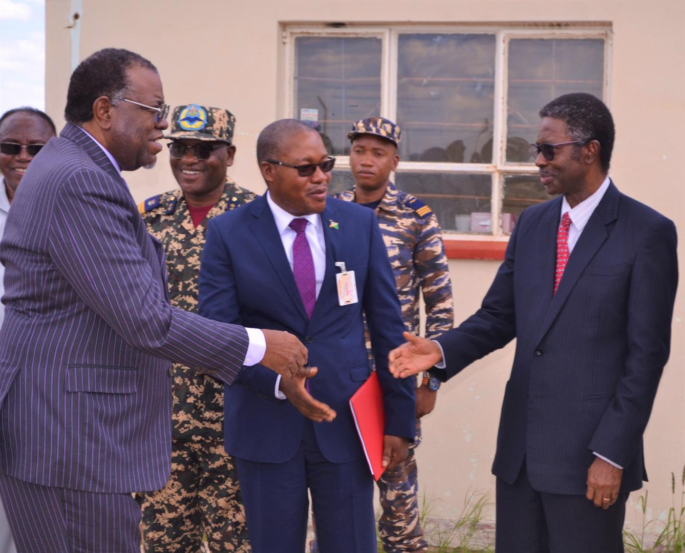 His Excellency, Dr Hage Geingob, President of the Republic of Namibia greeting WHO Representative, Dr Charles Sagoe-Moses during a visit to the Hosea Kutako International Airport in 2020 as part of government preparedness efforts.