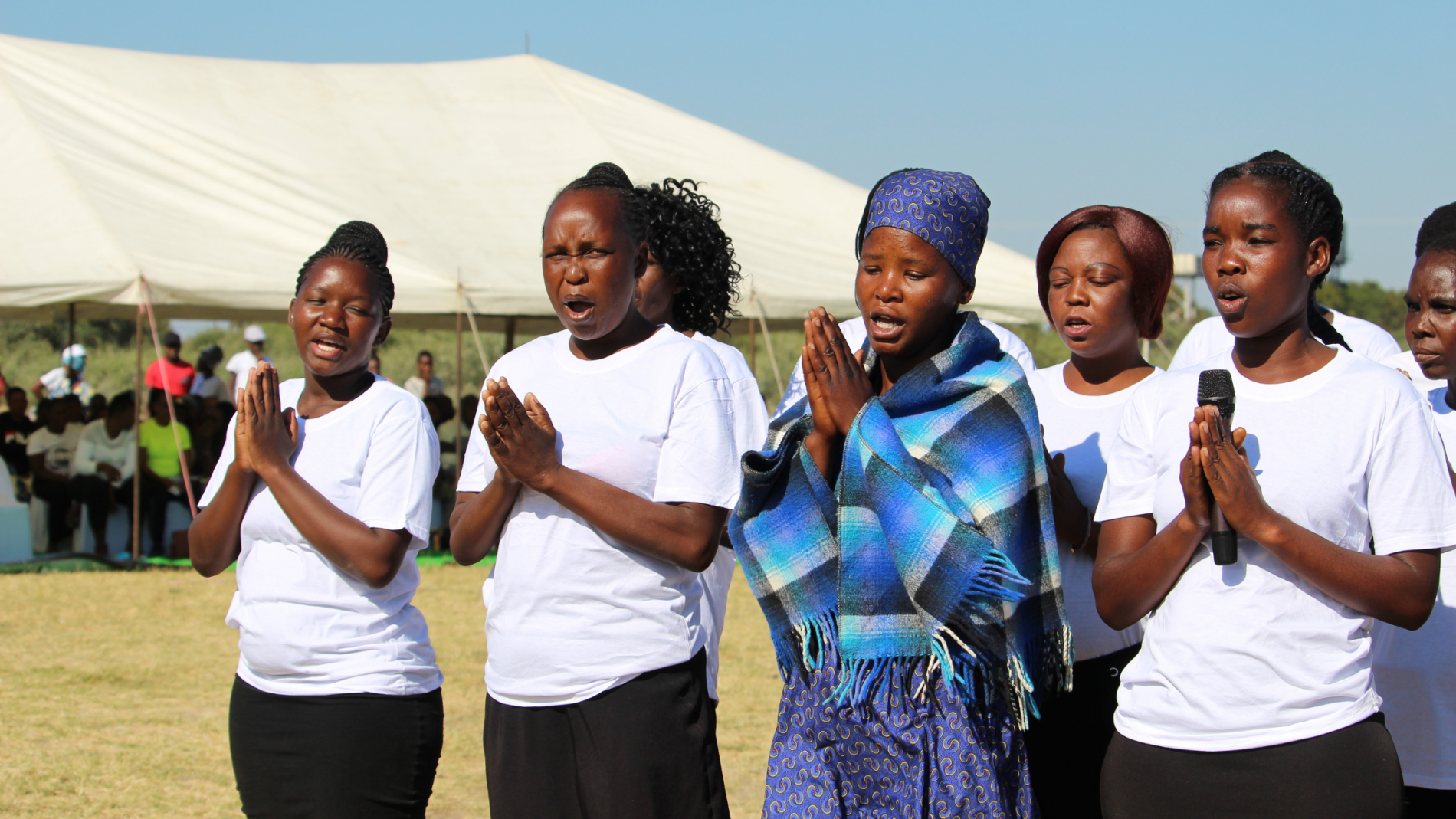 An improvised song about ending malaria in Botswana is performed by a choir during the World Malaria Day commemoration in Maun