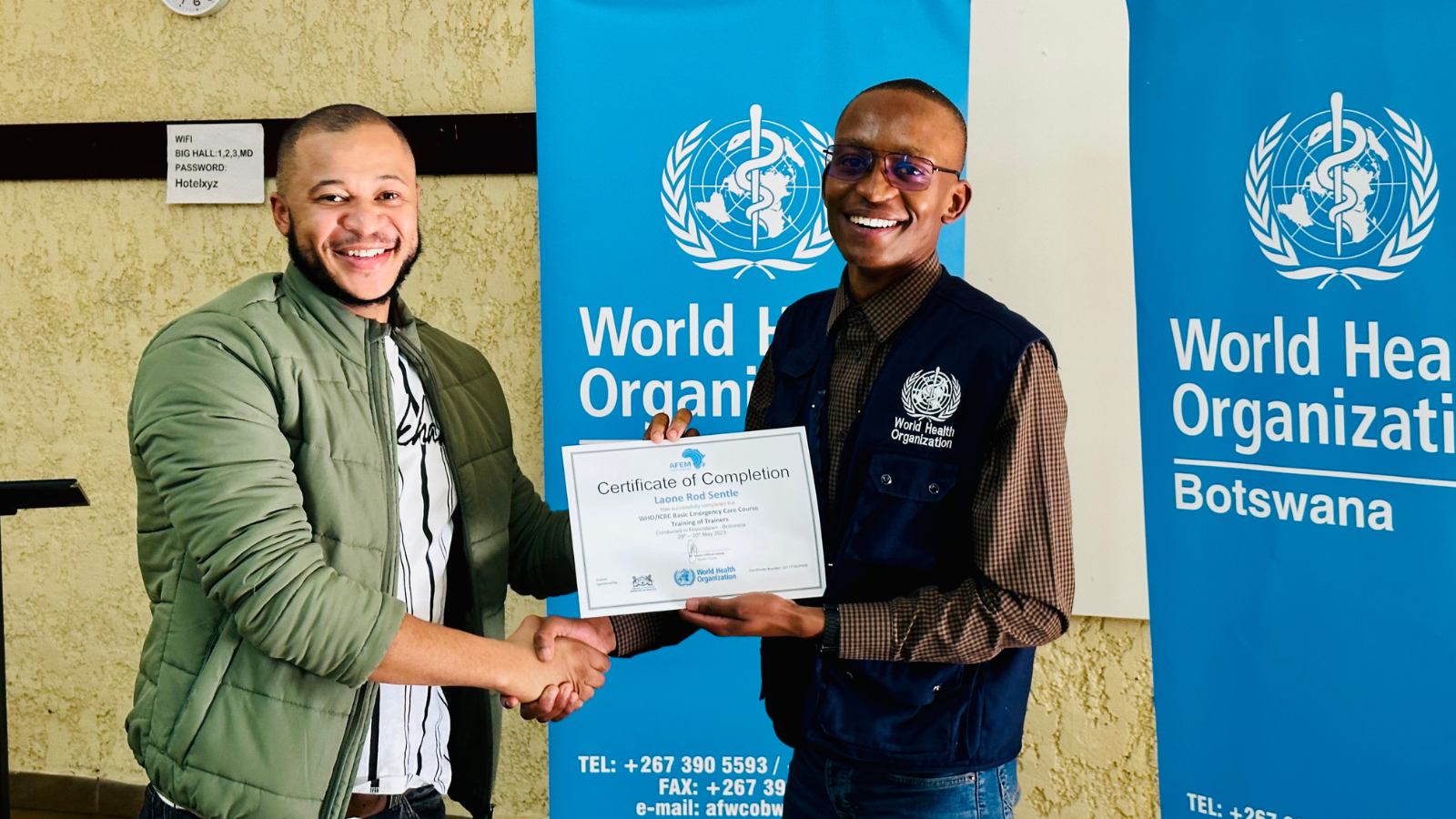 Dr Theo Ntenegi WHO Botswana Case Management Officer presenting an award of completion to a Basic Emergency Care graduate following the Greater Gaborone district training in May 2023 