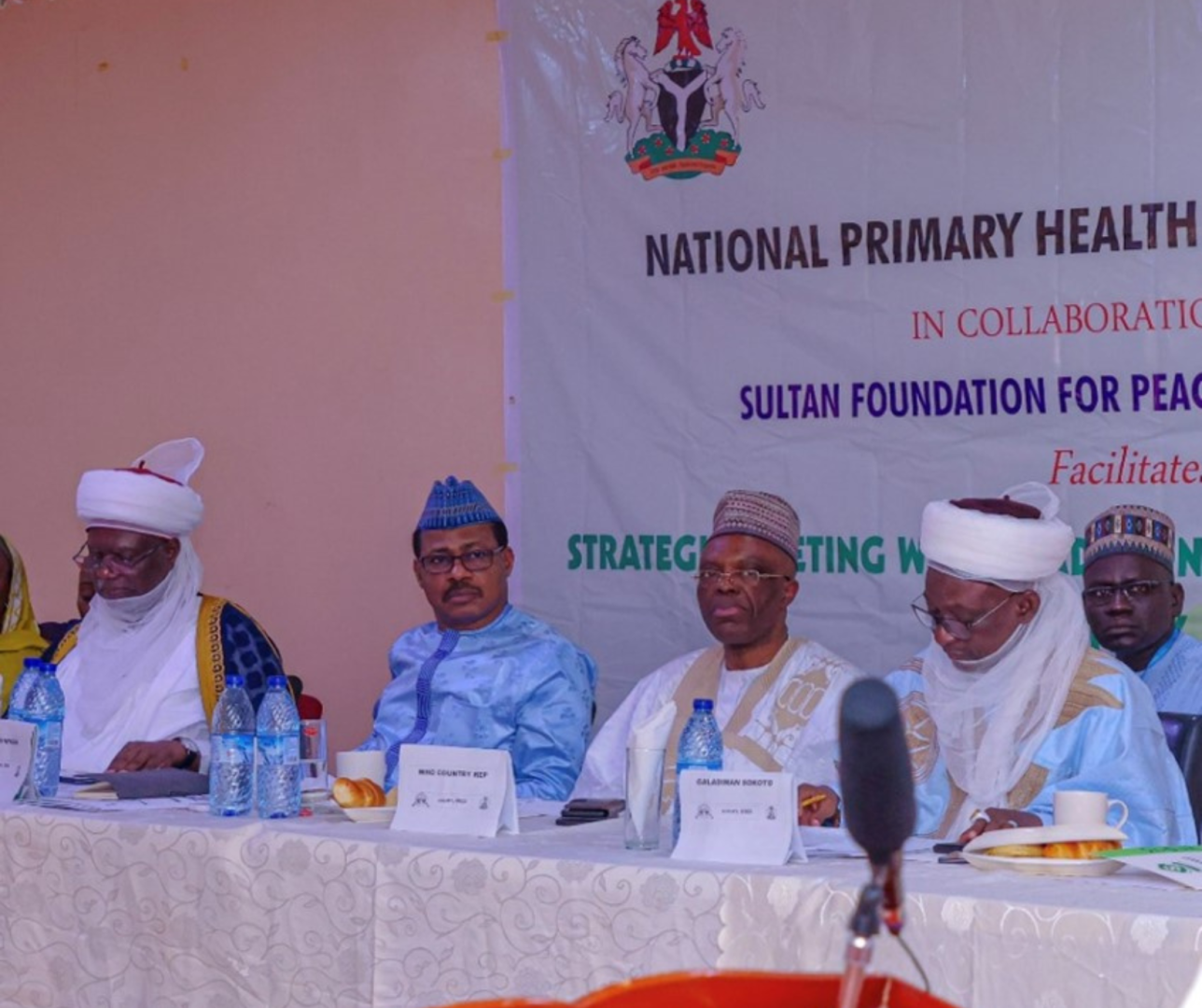 L-R – Emir of Arugung Alh  Mera, ED NPHCDA, Dr Shuaib WHO Country Representative, Dr Mulonbo and  another emir at  the Northern Traditional Leaders meeting on PHC strengthening 