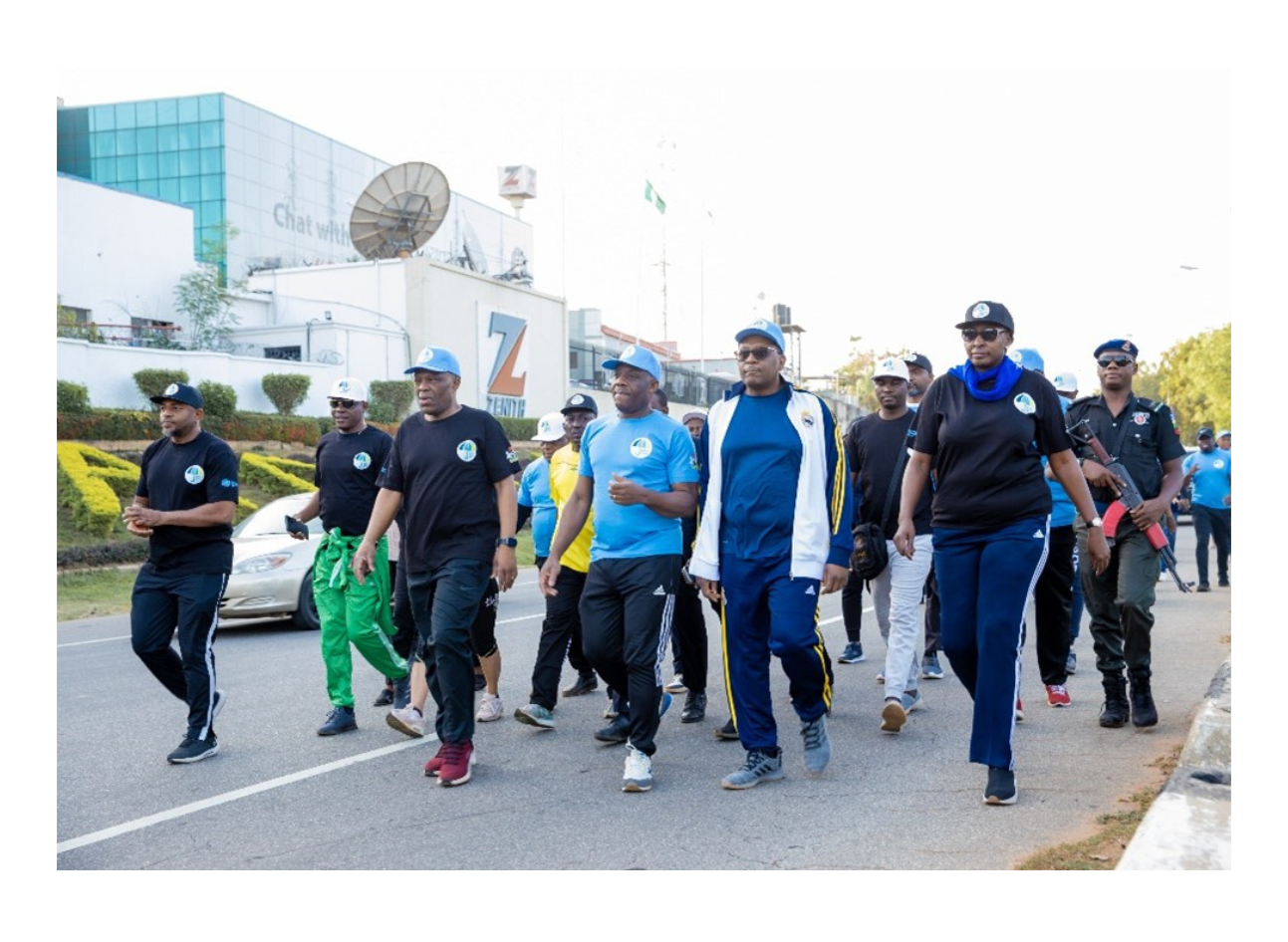 2023 #UHC Day commemorative walk in Abuja led by the Coordinating Minster for Health and Social Welfare Prof Pate accompanied by the WHO Country Represntative Dr Mulombo