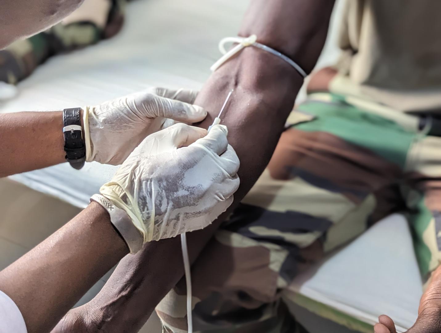 A volunteer donating blood during the World Blood Donor Day event at the Bwiam General Hospital