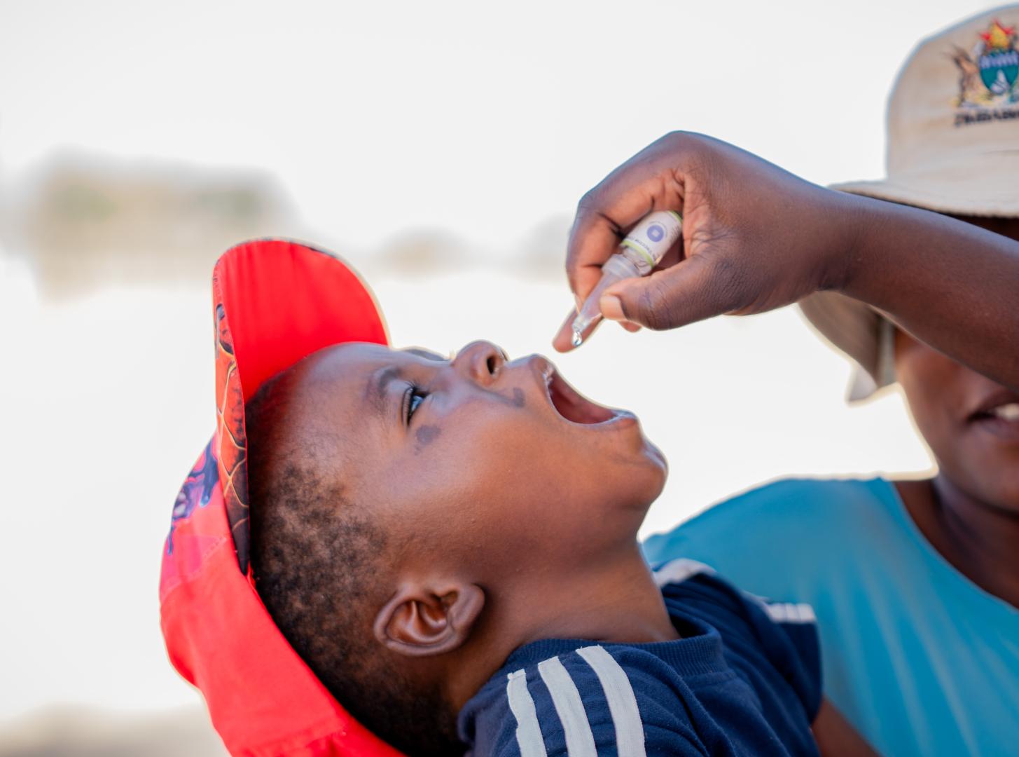 Child receiving polio vaccine