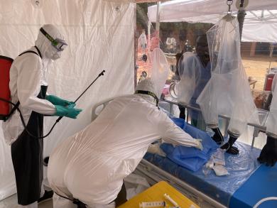 Doctor inside an isolation tent during an emergency