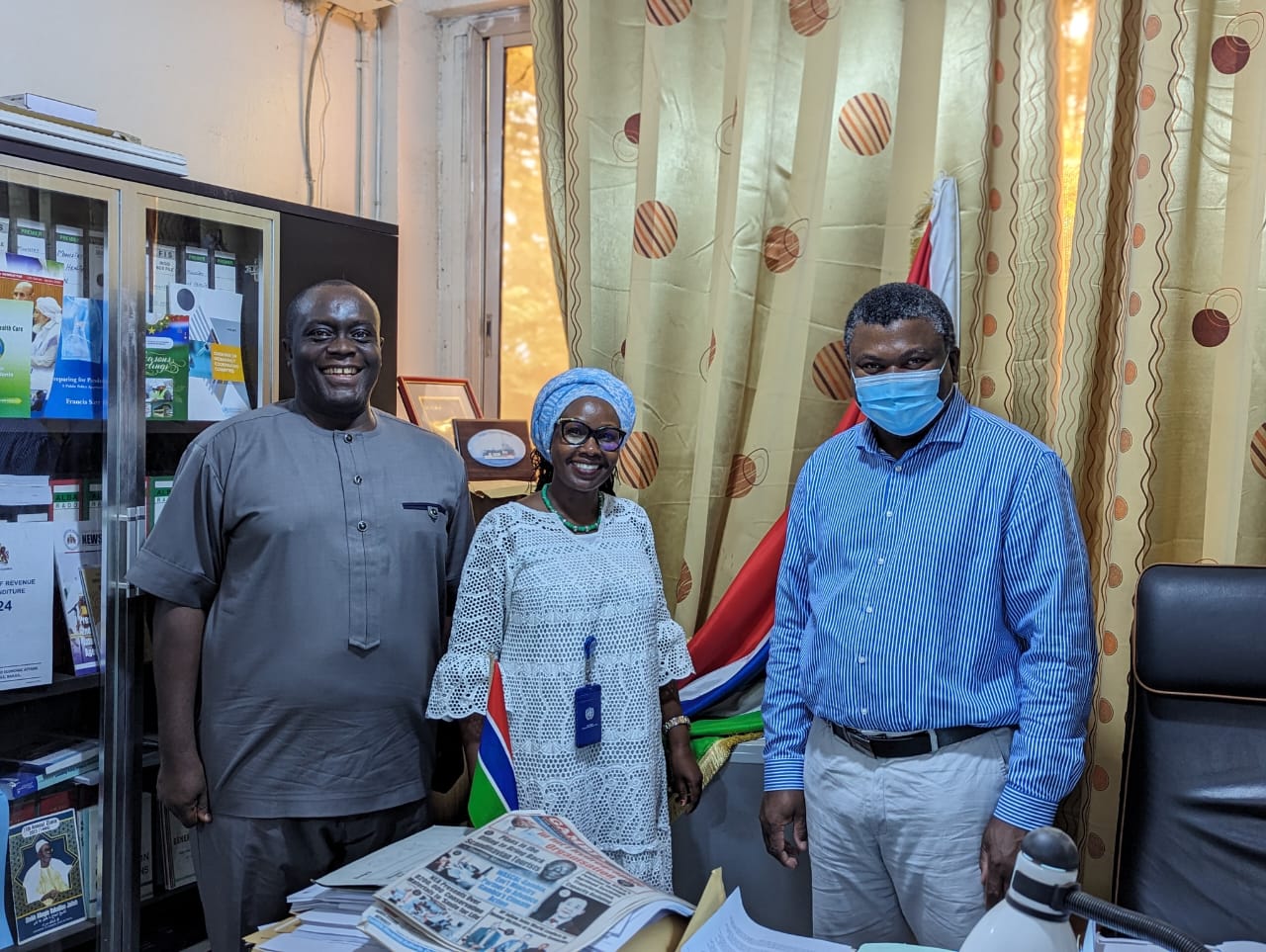 Dr. Jane Maina (center) with the Honorable Minister of Health, Dr. Ahmadou L. Samateh (right)