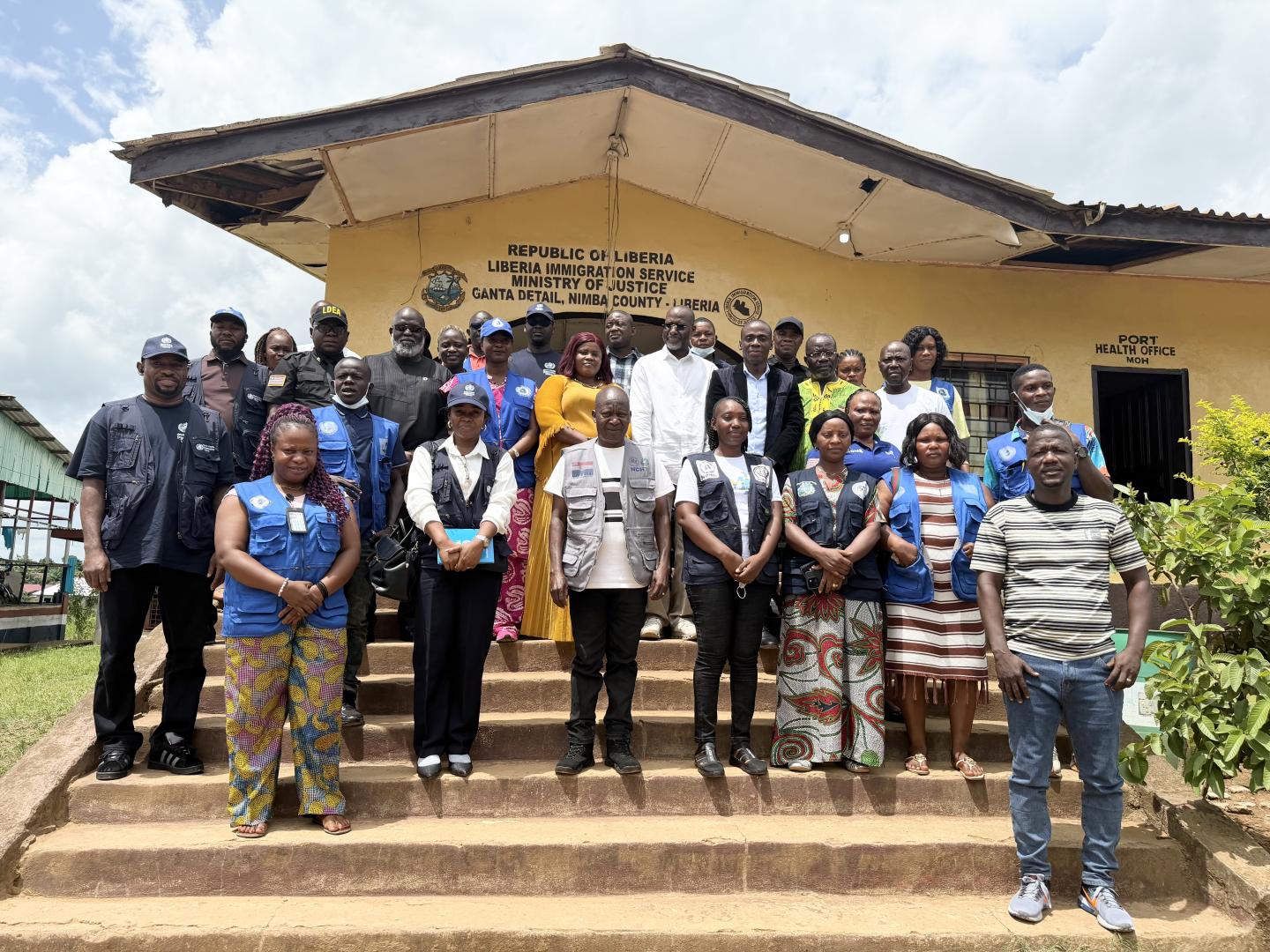 Assessment team and partners pose for a group photo during a field visit to review health service delivery and community health priorities.