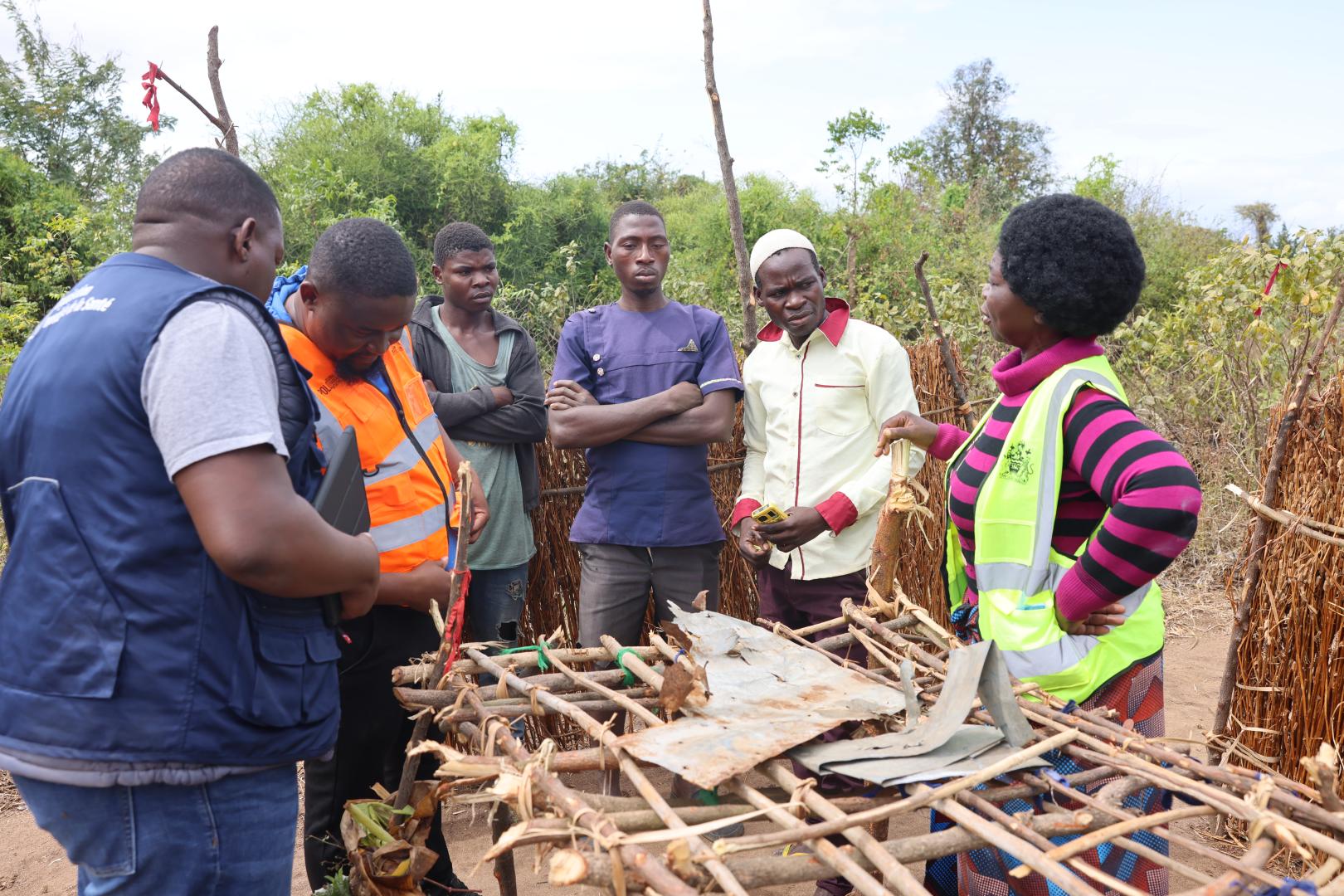 WHO and Chikwawa DHO health workers engaging with Simba leaders to vaccinate children at Bendana initiation center