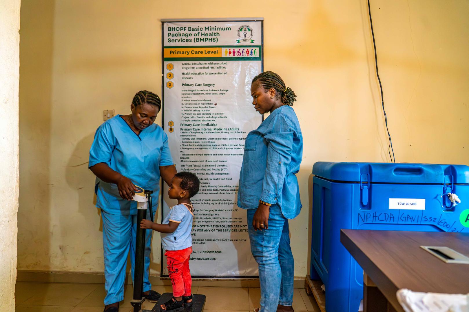 A child being measured at a heart care facility