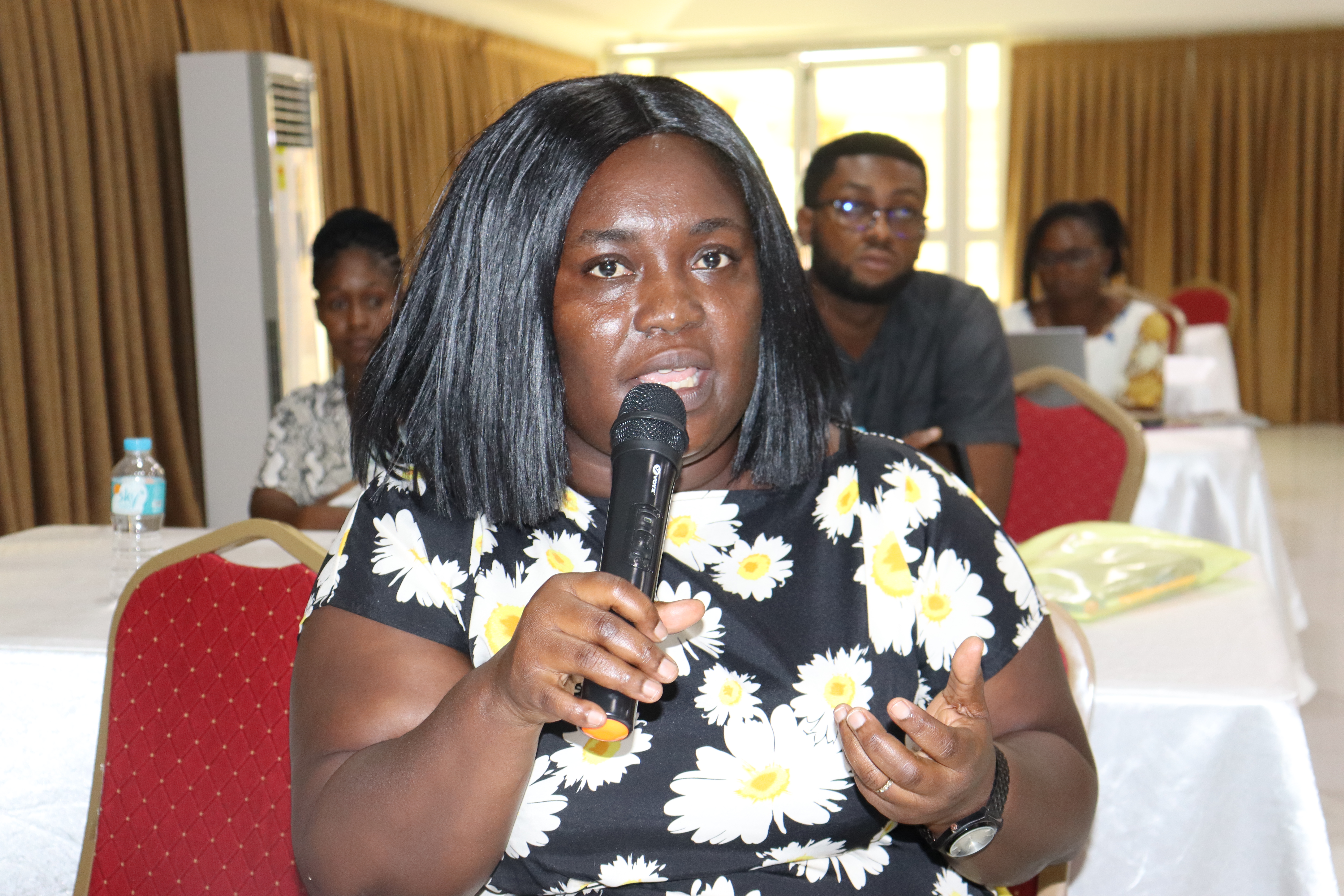 Amma Gyankomah Asirifi, Bono Regional Health Promotion Officer, contributing a discussion on health education
