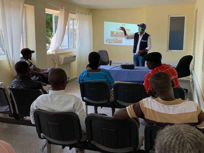 A WHO Polio staff member trains traditional healers on Covid-19 awareness raising and prevention in Namibe province, Angola, 2020 © WHO