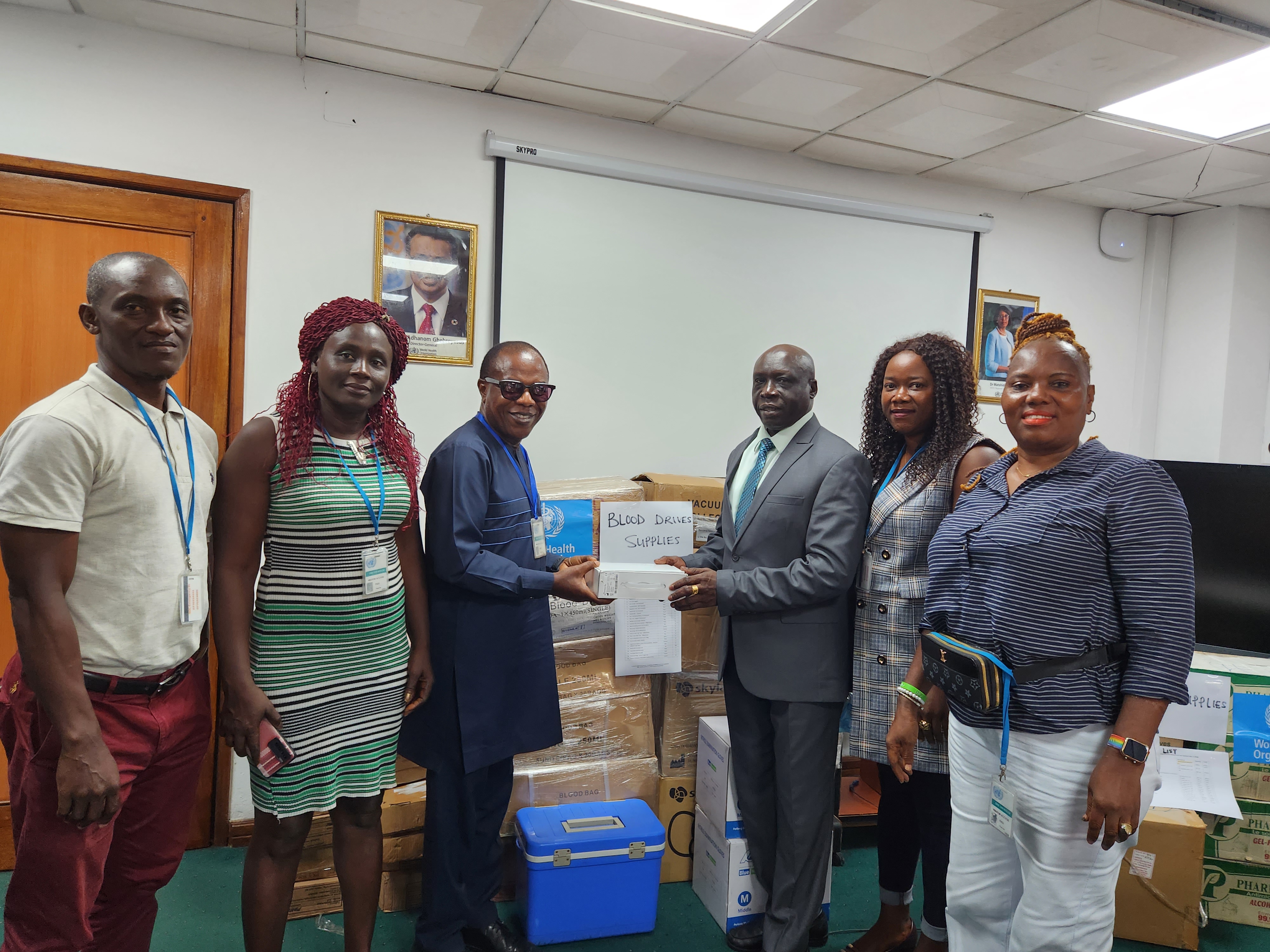 Dr. Peter Clement, WHO Representative handovers supplies to MOH 
