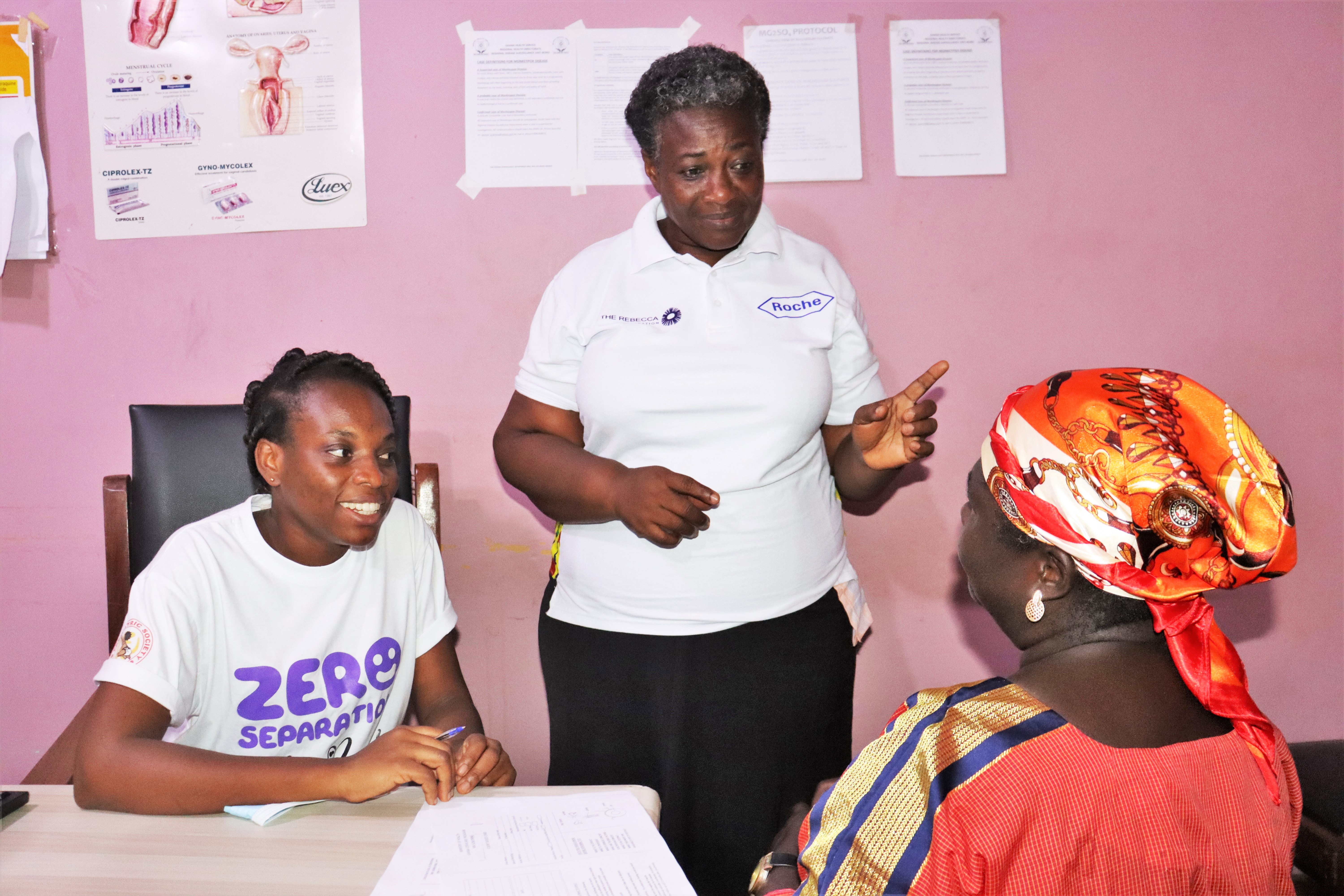Primary healthcare workers using WHO-PEN module to educate a woman about breast cancer before screening her at the Sunyani Municipal Hospital
