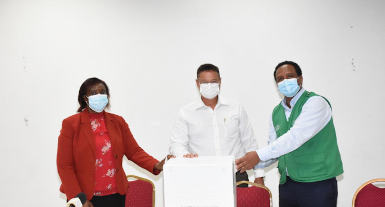 Dr. Jude Gedeon Public Health Commissioner accepting the genomic sequencer from Dr Sofonias Tessema Africa CDC’s program Lead for Africa Pathogen Genomics Initiative and Dr Susan Tembo, acting WHO Representative for Seychelles.