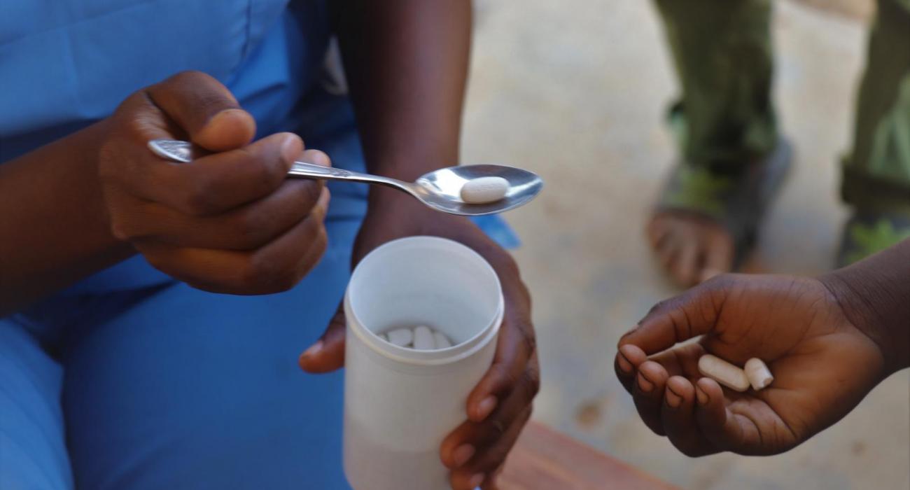 Child receiving her deworming medication during the campaign 