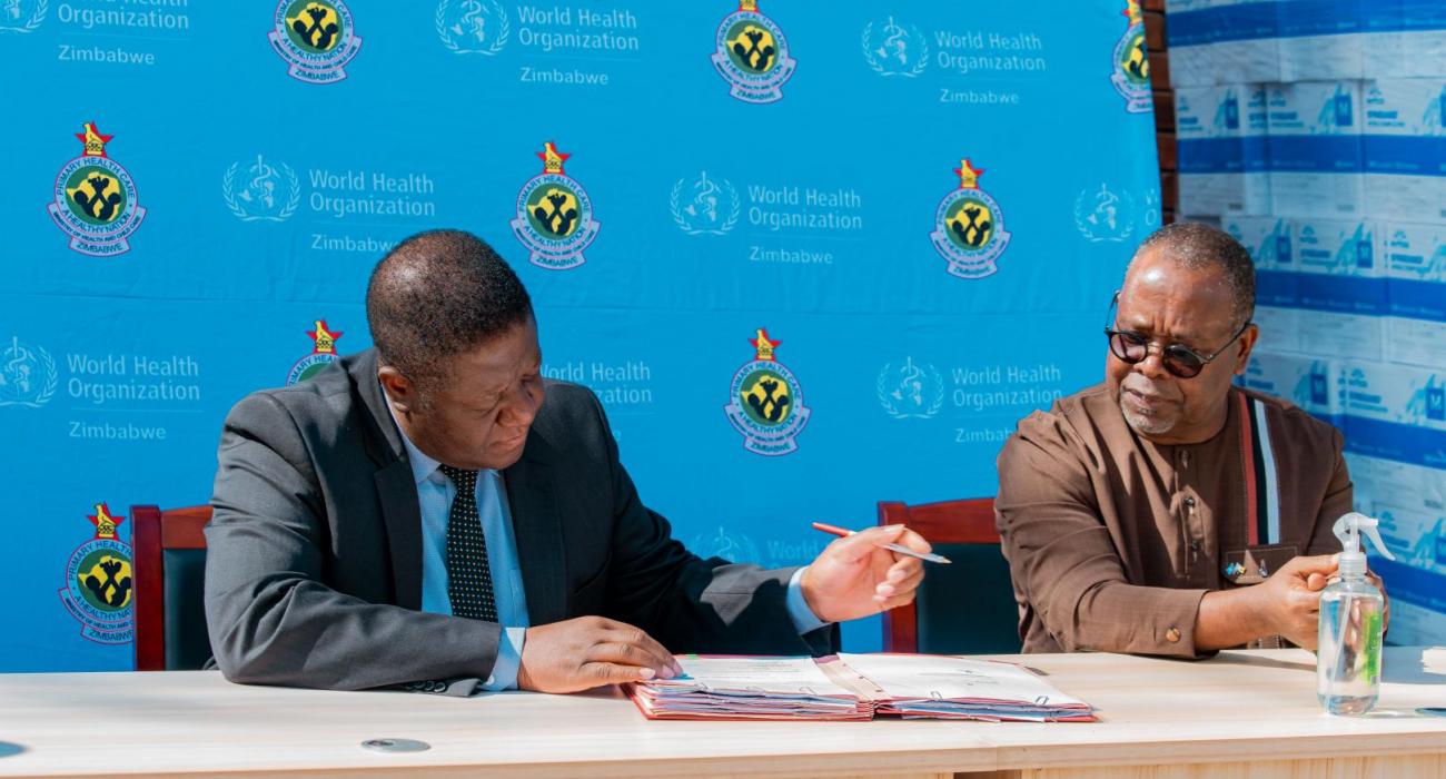 MoHCC Permanent Secretary Dr Jasper Chimedza and The WHO Country Representative for Zimbabwe Professor Jean-Marie Dangou during the handover ceremony
