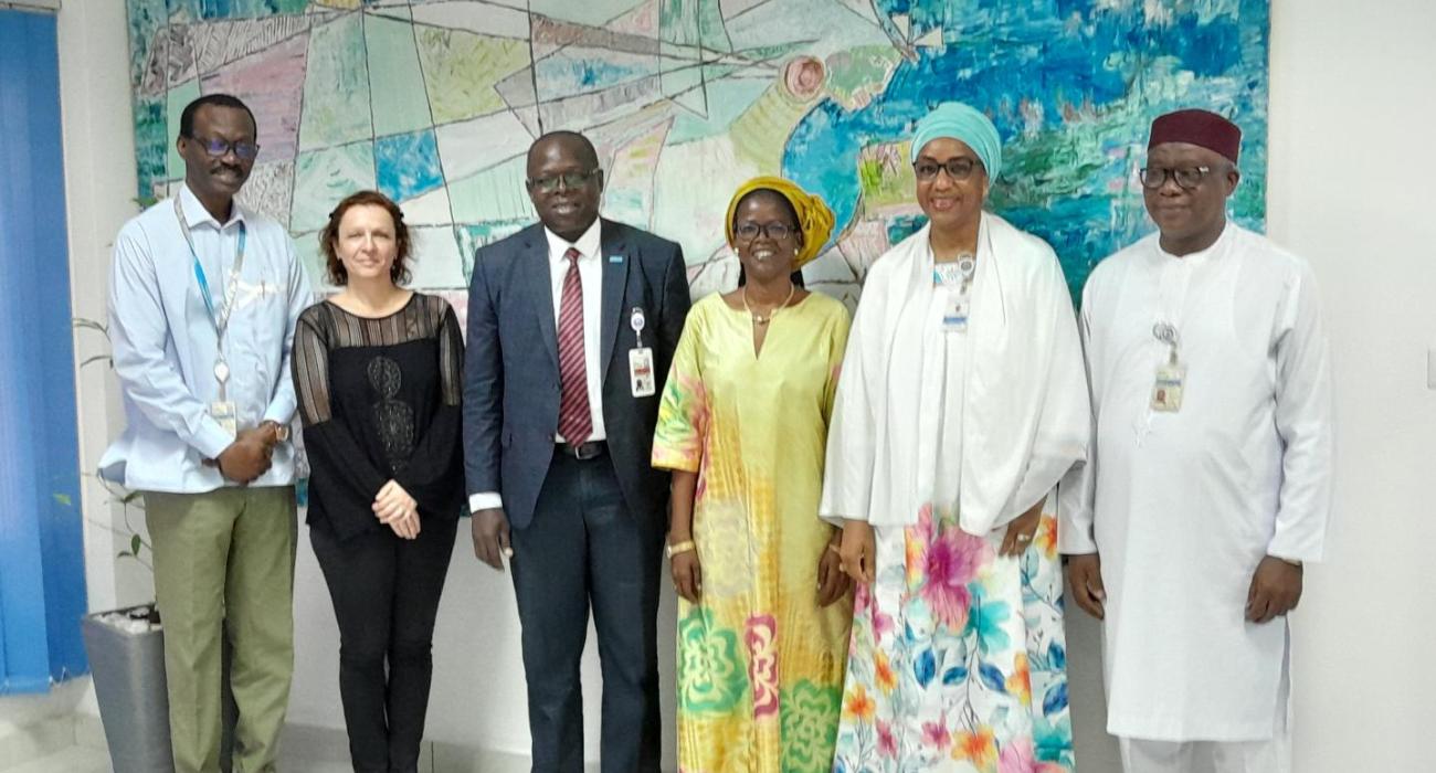 Photo de groupe de la délégation de l'OMS et l'équipe de l'UNICEF