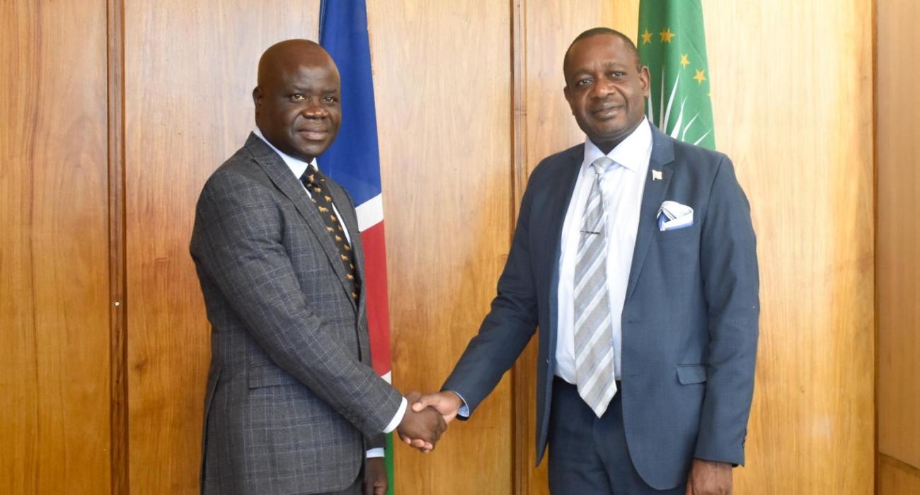 Dr. Richard Banda, WHO Representative to Namibia with the Hon. Dr. Peya Mushelenga, Minister of International Relations and Cooperation