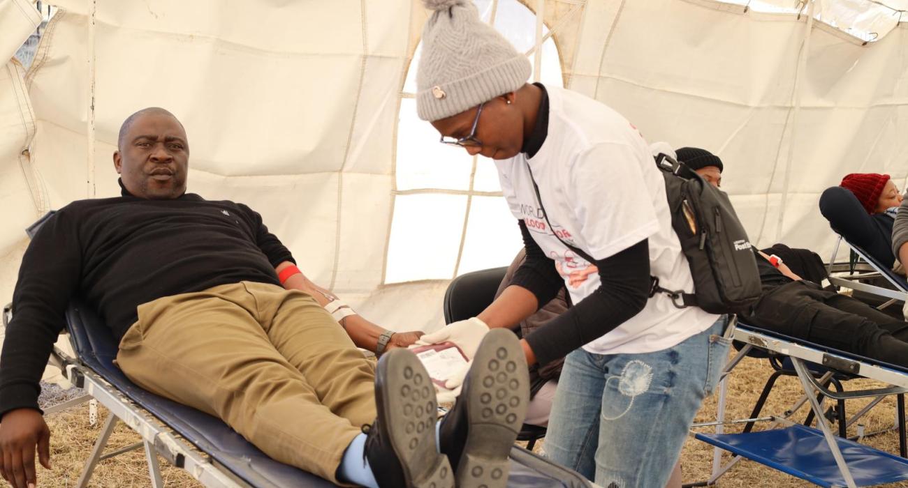 Lesothos Honorable Minister of Health, Mr. Selibe Mochoboroane leads by example by donating blood during the national World Blood Donor day commemoration